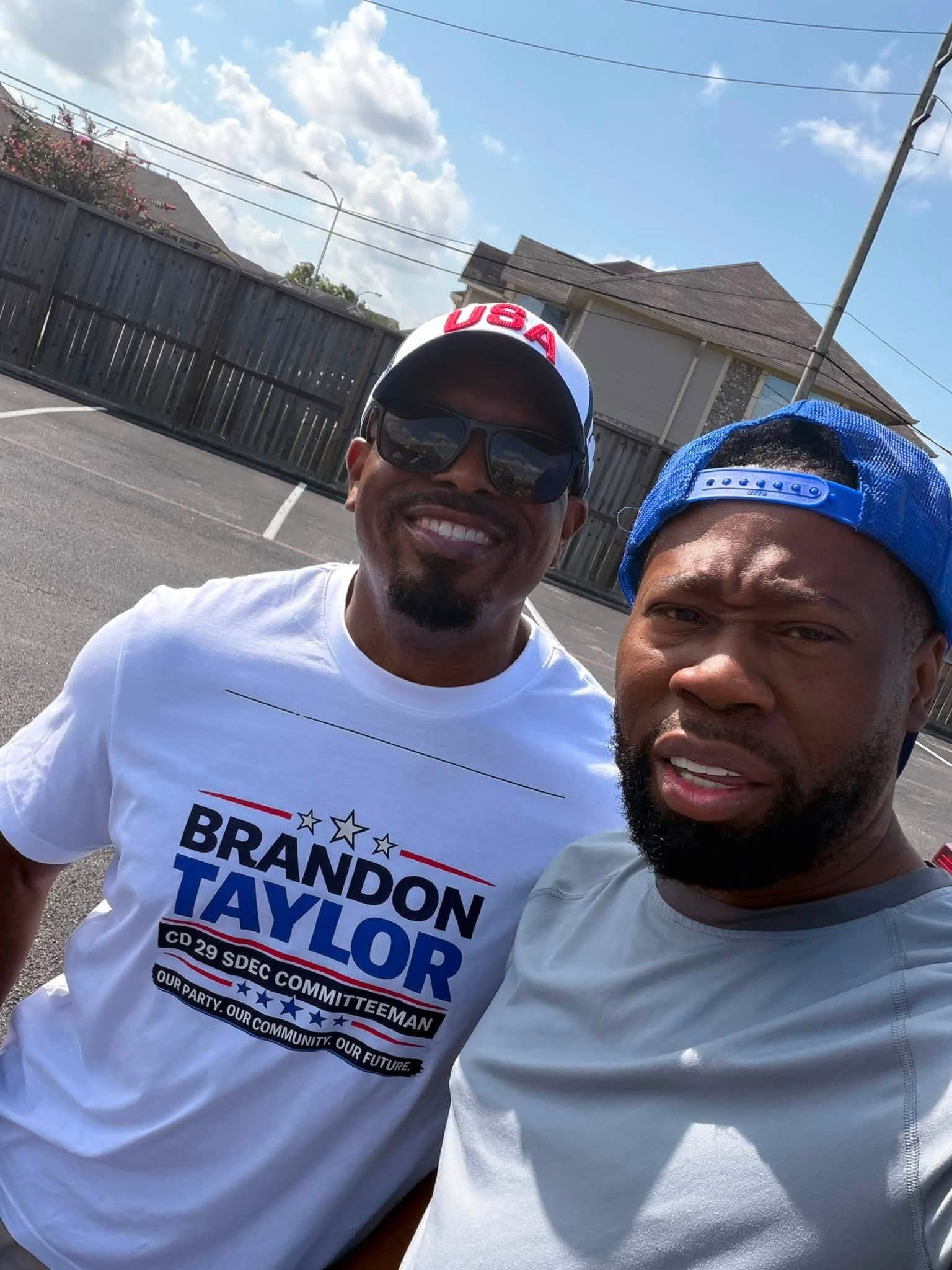 Brandon K. Taylor with a fellow canvasser in Northwest Houston